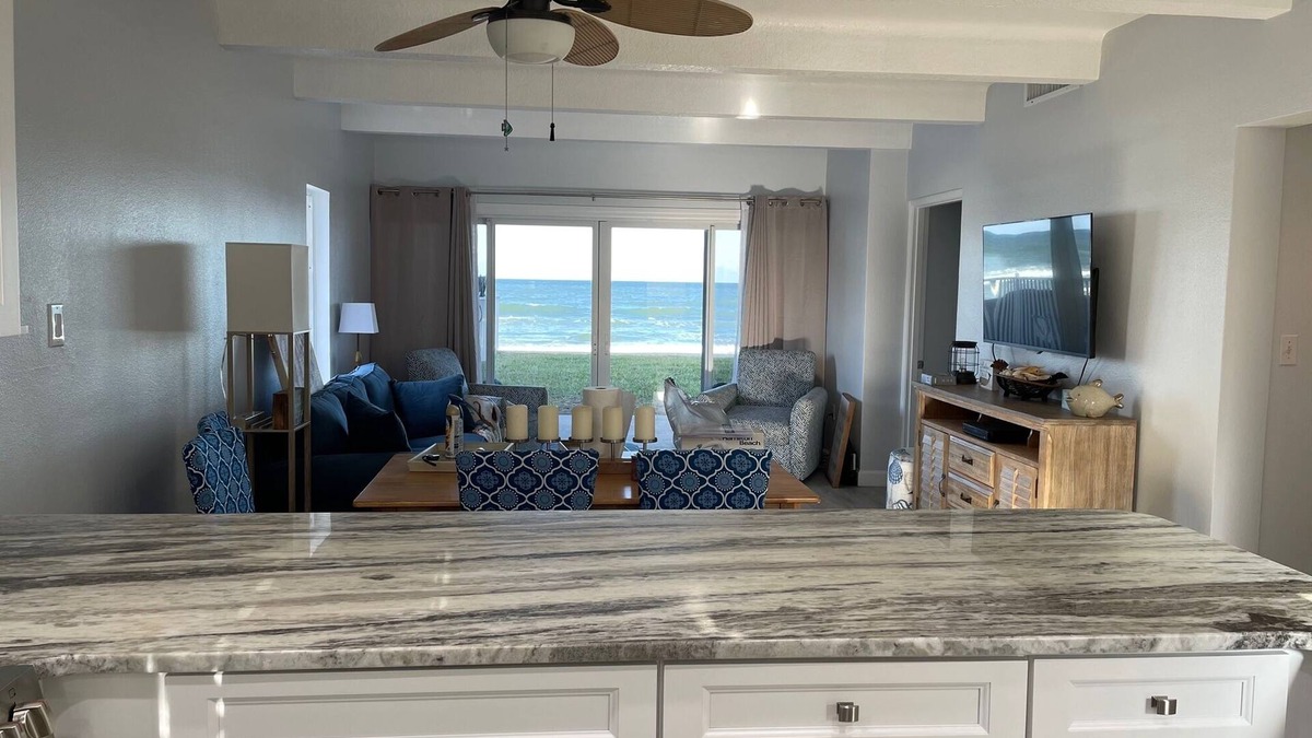 New Smyrna Beach Condo | RENOVATED 1st FLOOR DIRECT OCEANFRONT CONDO - Just steps from the beach and pool