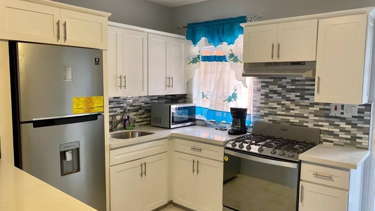 Lucea Apartment | Renovated family-sized home, just a few short minutes from the beach!