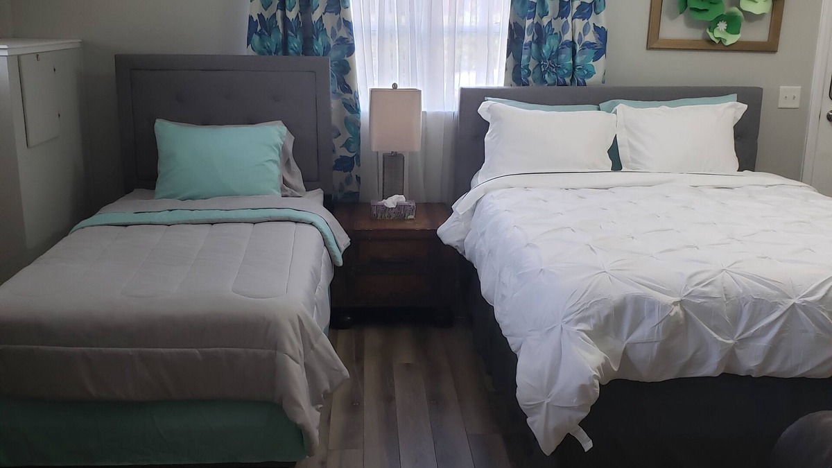 Goldsboro Apartment | Renovated Suite with 1 queen bed and a Twin. Kitchen & bath for your privacy.