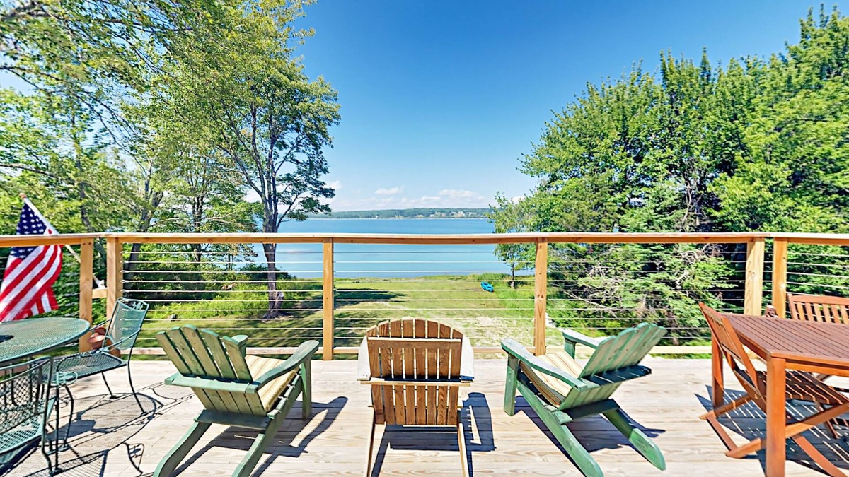 Lamoine Beach Cottage | Renovated waterfront cottage with expansive deck, multiple fireplaces, & grill