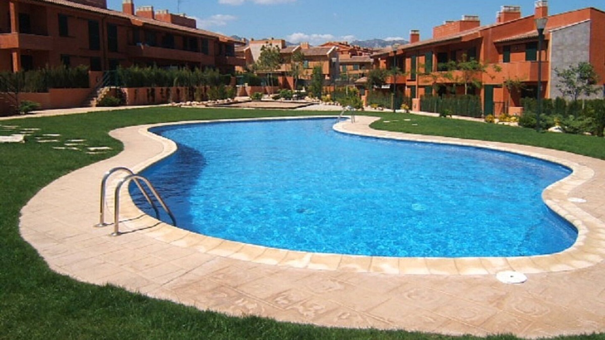 L Almadrava Apartment | Residential apartment on ground floor with garden and direct access to the swimming pool.