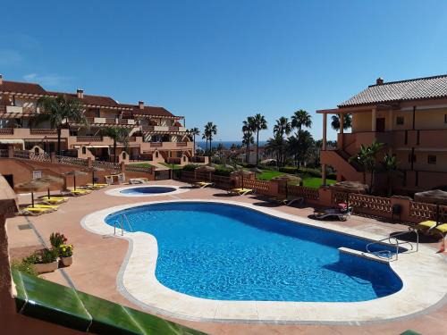 El Faro Apartment | Resort Alta Loma, beach and pools