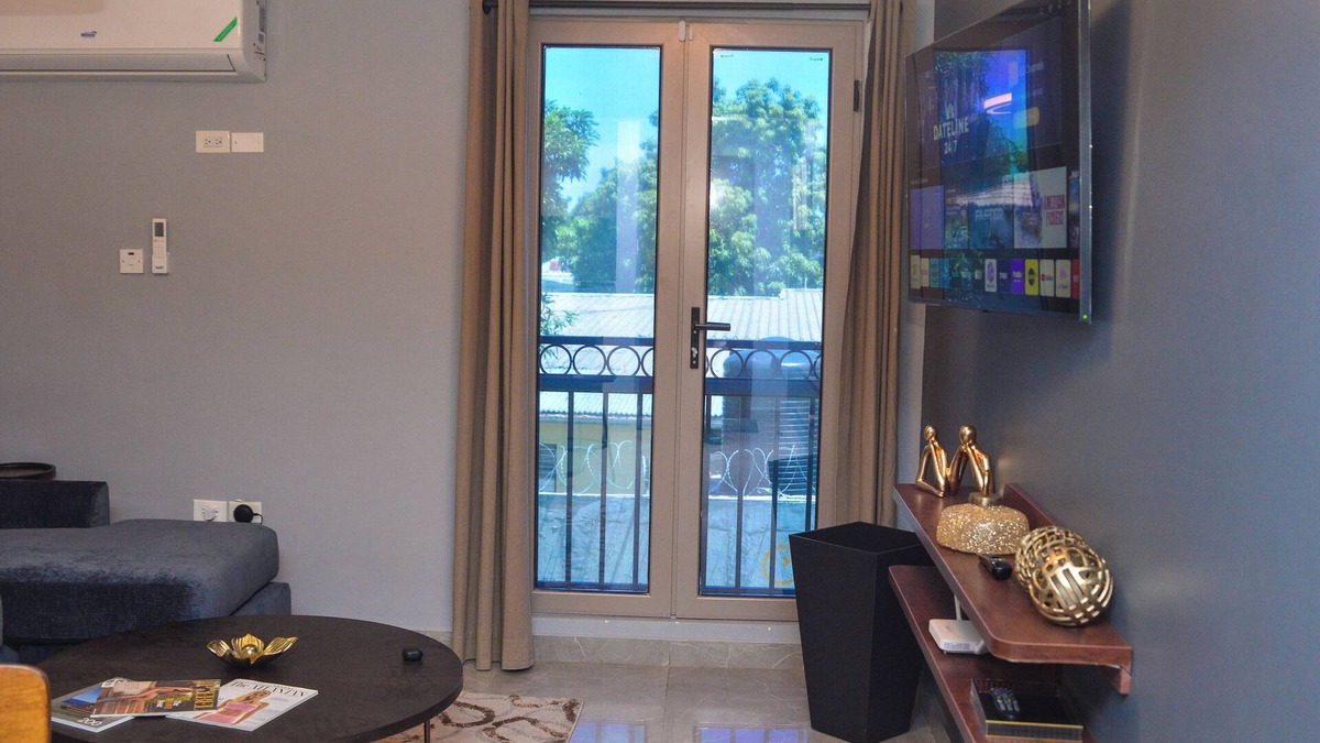 Eden Gardens Apartment | Resort like accommodations in Kingston with WiFi, AC, Pool and Rooftop. King bed
