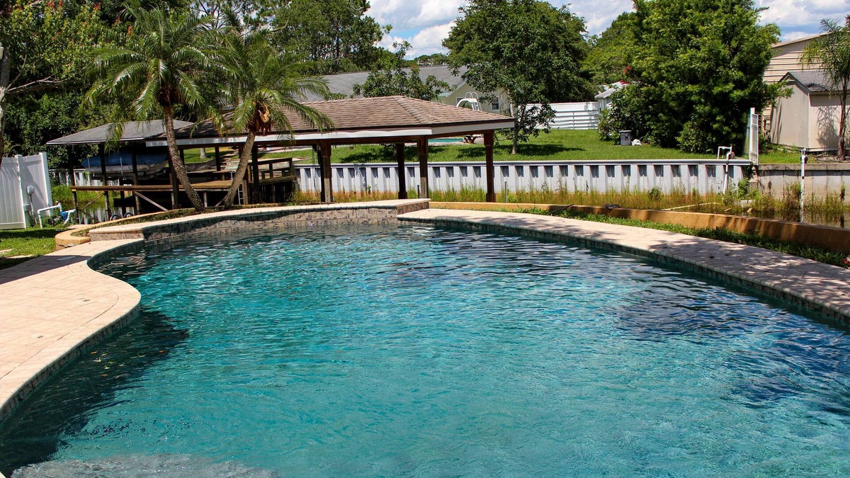 Orlando House | Resort Like Private Pool Waterfront Retreat 4/2 Home in Orlando Weekly discounts