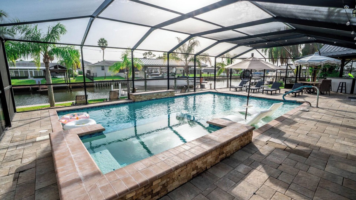 Apollo Beach House | Resort-Style Canal Home w/Pool & Putting Green - Baywatch