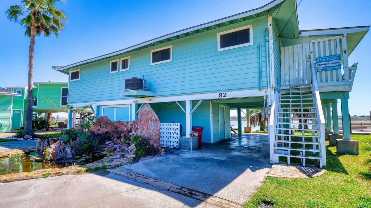 Surfside Beach House | Rest/relaxation fishing right from the dock in your front yard under green light