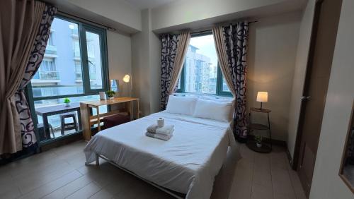 Pasay Apartment | Restful Layover Condo Across NAIA3