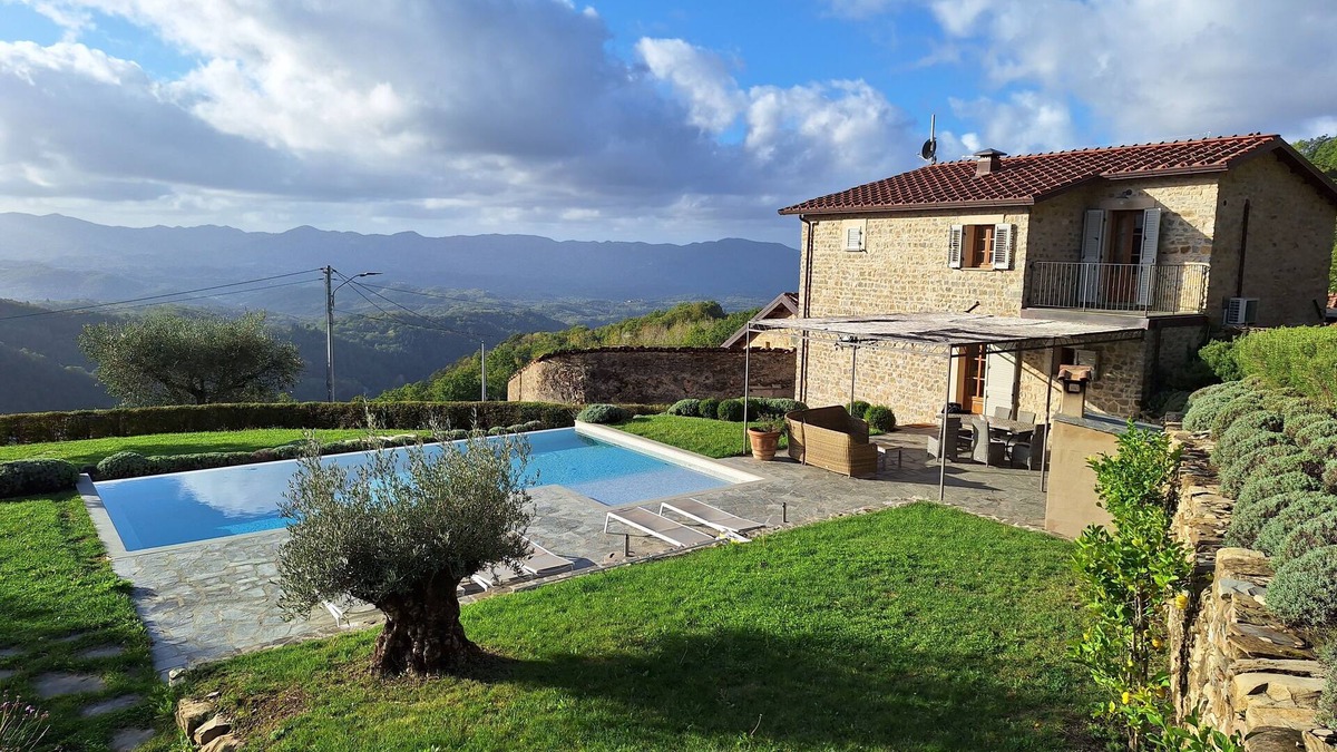 Licciana Nardi House | Restored Farmhouse With Infinity Pool, Mountain Views and Landscaped Garden