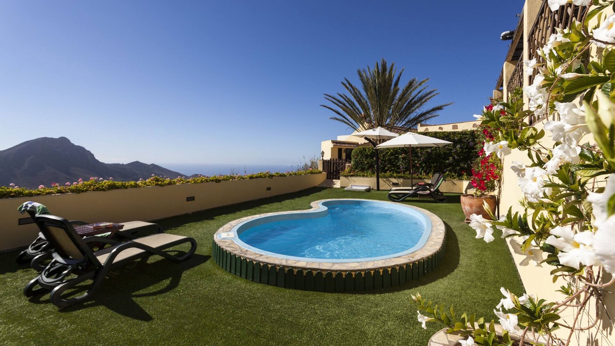 Valle de San Lorenzo Villa | Restored finca.,large terrace, garden, private pool, jacuzzi, great views.