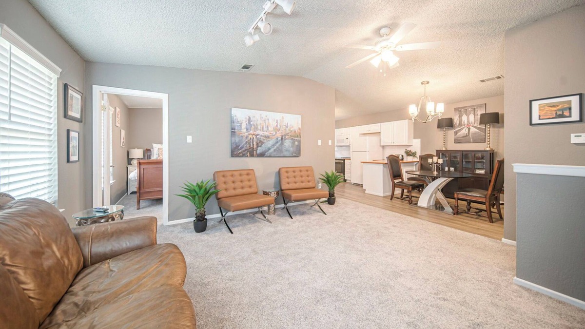Midland House | Right at Home-Uptown Place with gated yard and covered parking