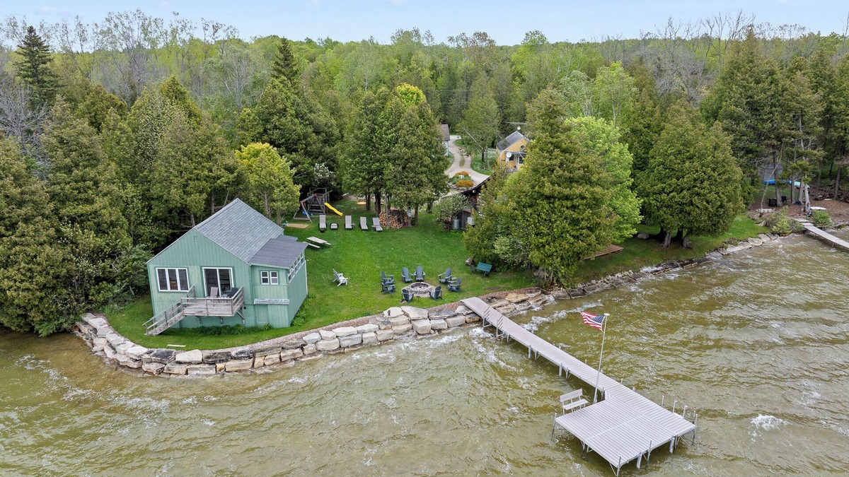 Baileys Harbor Cabin | Right on the water-Dog Friendly Cottage with kids playground