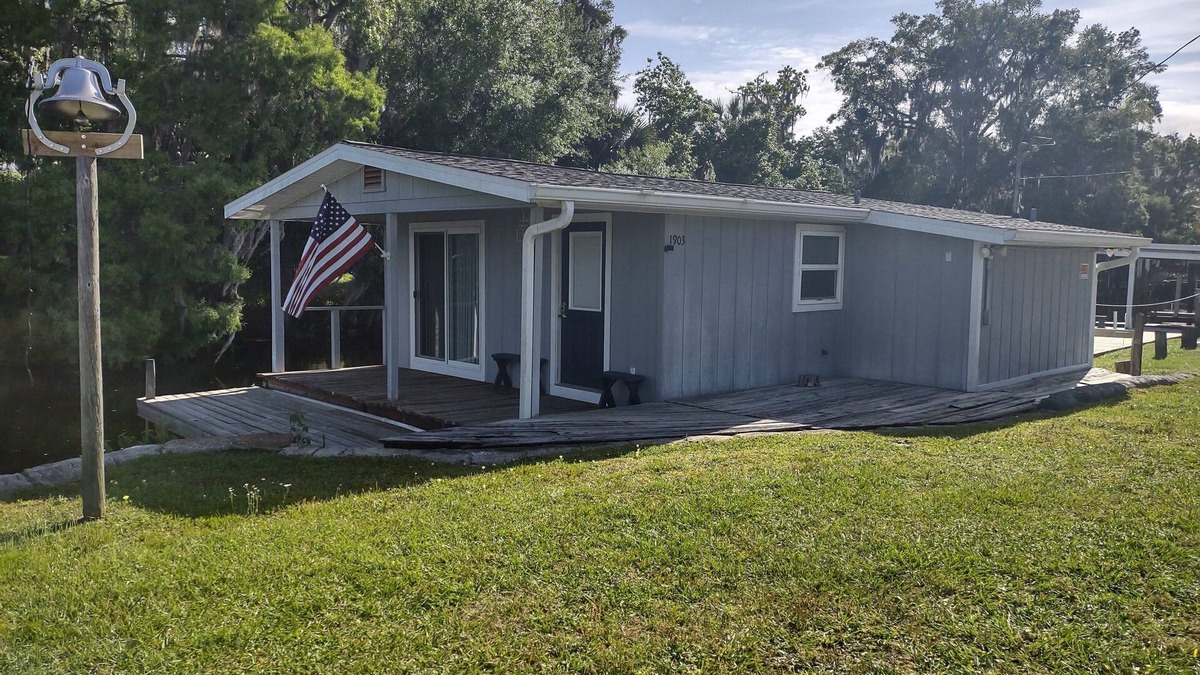 Dillard Estates Cottage | River front on the canal. Dock your boat at your deck porch.
