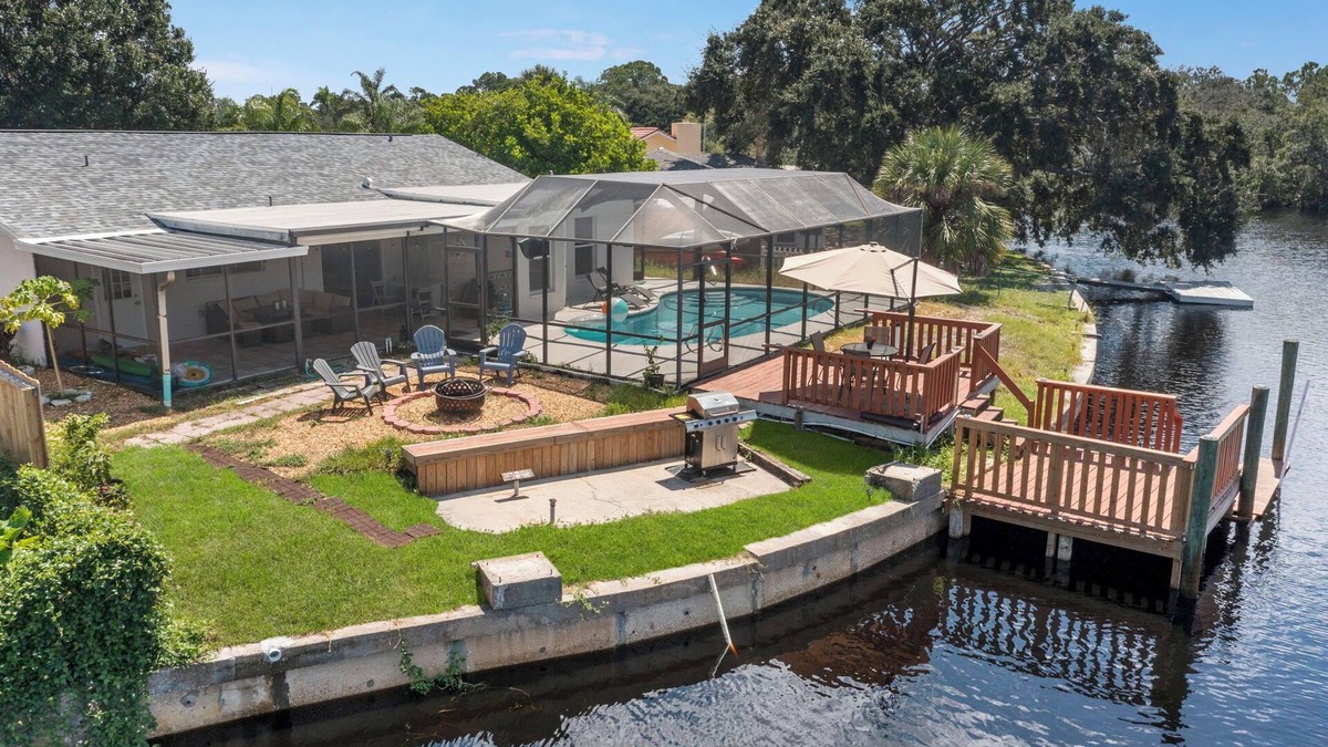 Forest Hills House | River House with heated Pool, Sunsets, Fishing, Dolphin & Manatee Watching