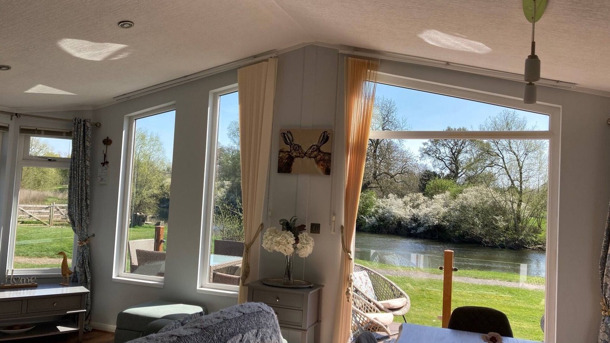 Tiddington House | River Retreat Lodge is front line with panoramic views over the river Avon.