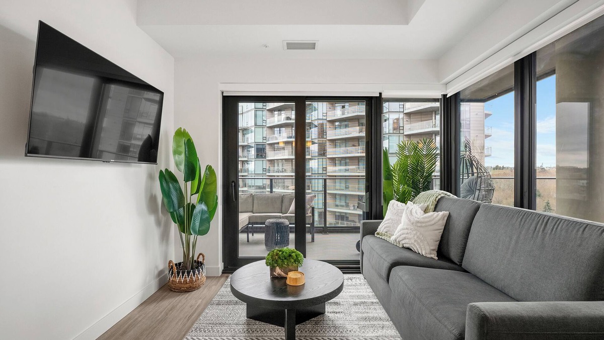 Eau Claire Apartment | River Views w XL Patio, Parking, Office, 2BR
