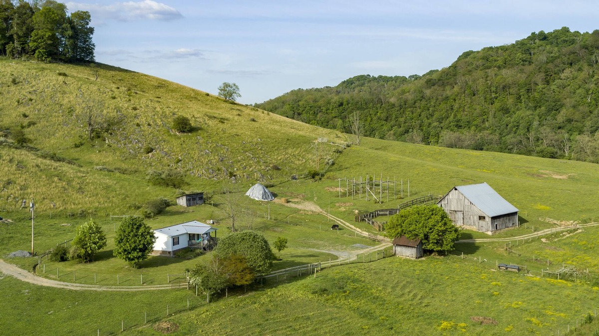 Mendota House | Riverfront Cattle Farm Home in the Mountains