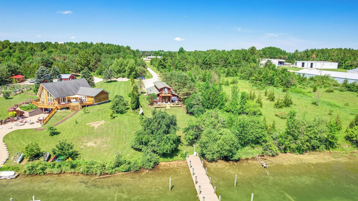 Cheboygan House | Riverfront Cheboygan Home w/Dock ~ 4 Mi to Town!