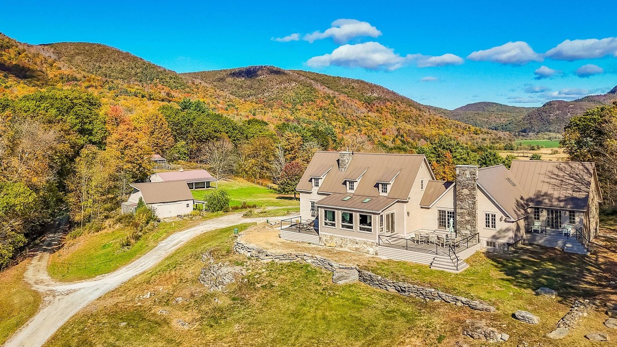 Pawlet House | Riverfront estate, mountain views, dog-friendly, fireplace, balcony, w/d, wifi