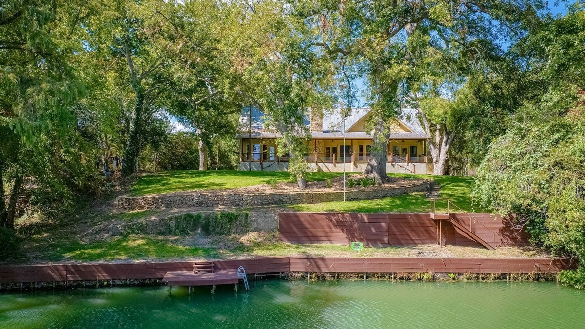Seguin House | Riverfront home on Lake Seguin with dock, kayaks, beautiful views & air hockey