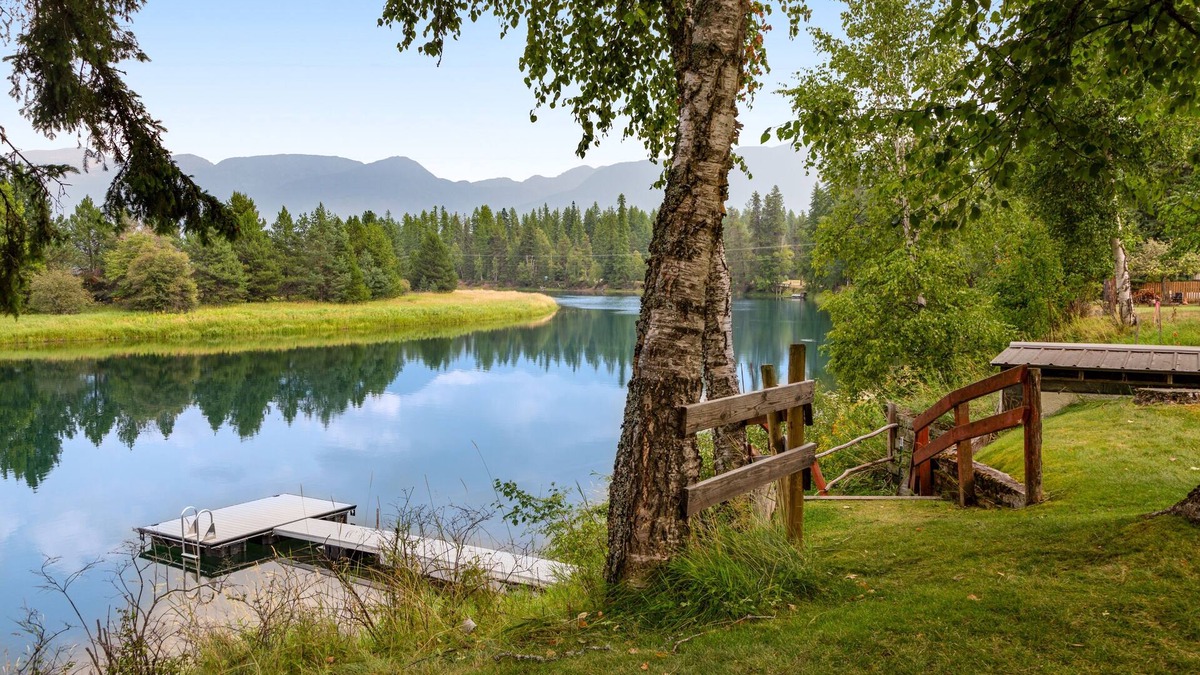 Bigfork House | Riverfront home with private dock, kayaks, 150+ ft Swan River frontage - dogs OK