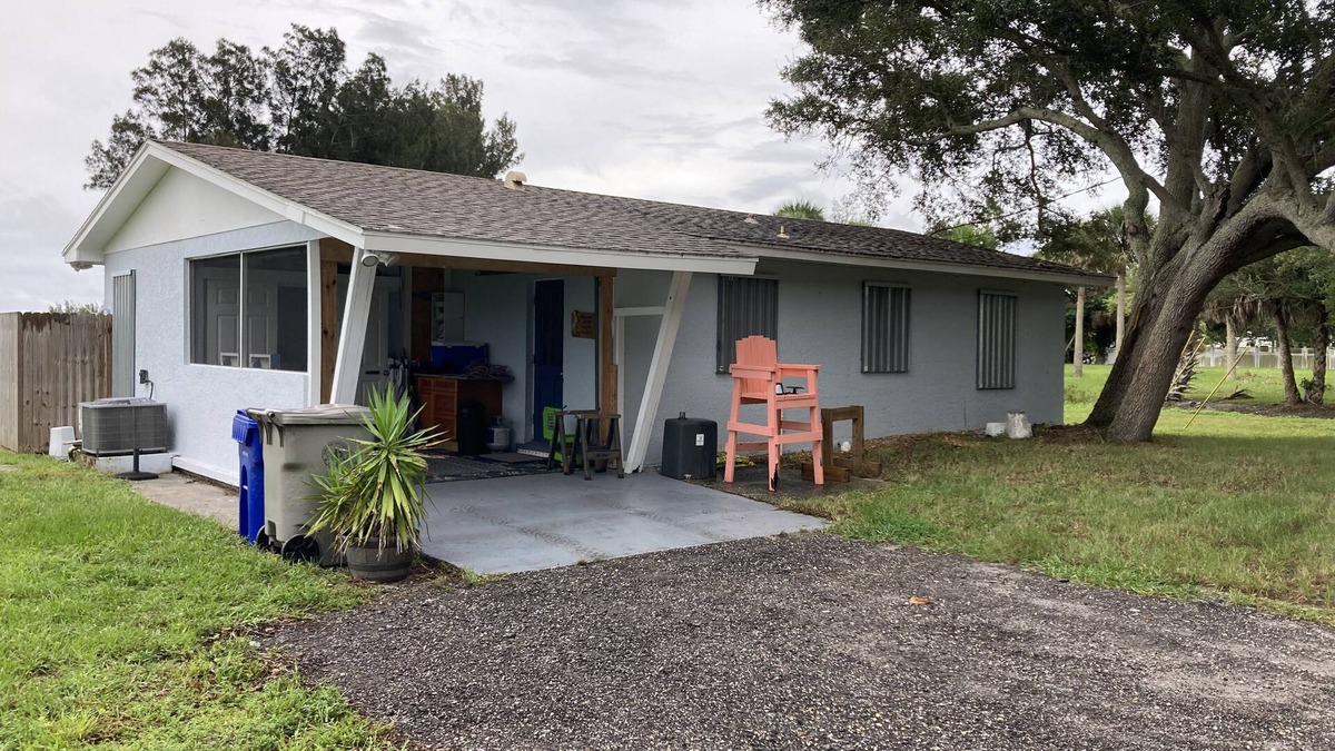 Sebastian Cottage | Riverfront home with a boat dock, WiFi, AC