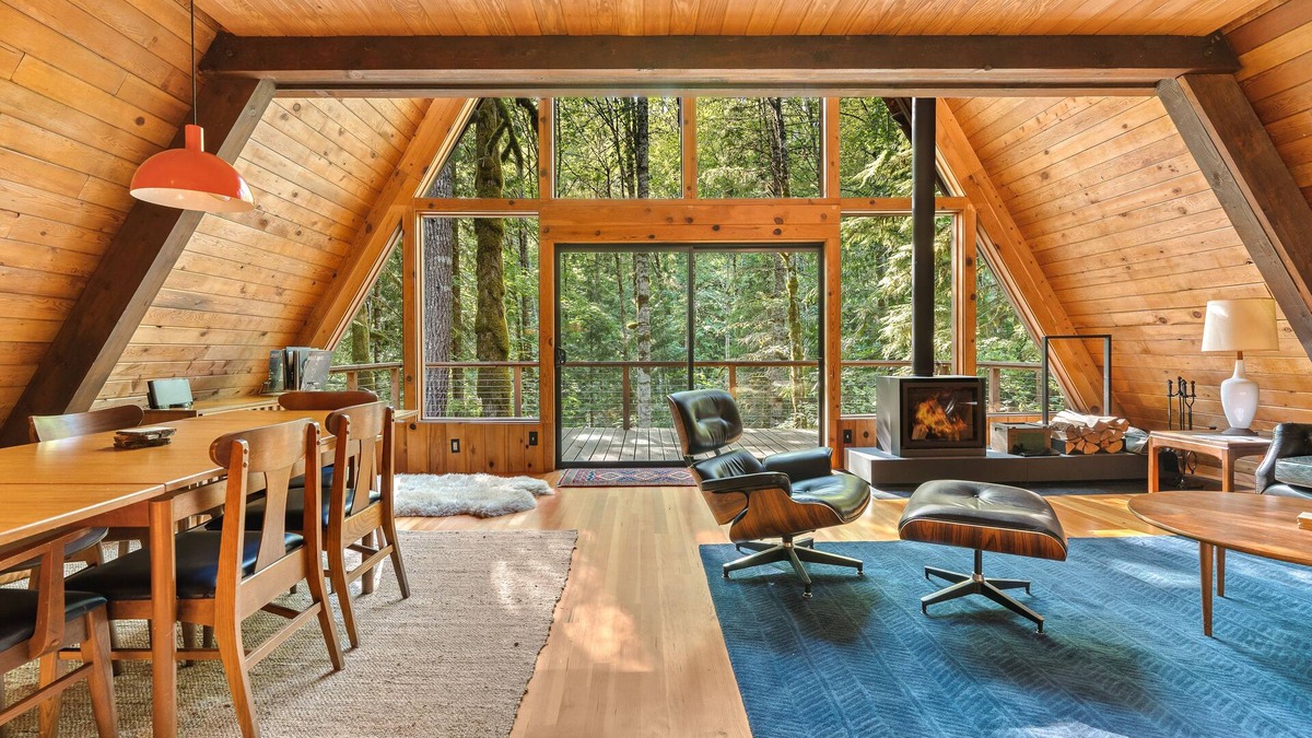 Rhododendron Cabin | Riverside A-frame in gated cabin community with private deck, woodstove, & W/D