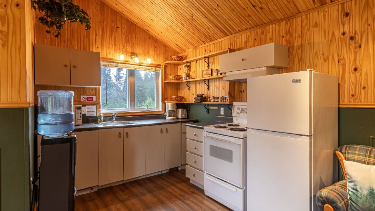Lac-Etchemin Ski Chalet | Riverside chalet with fire pit, indoor fireplace, perfect for nature retreats.