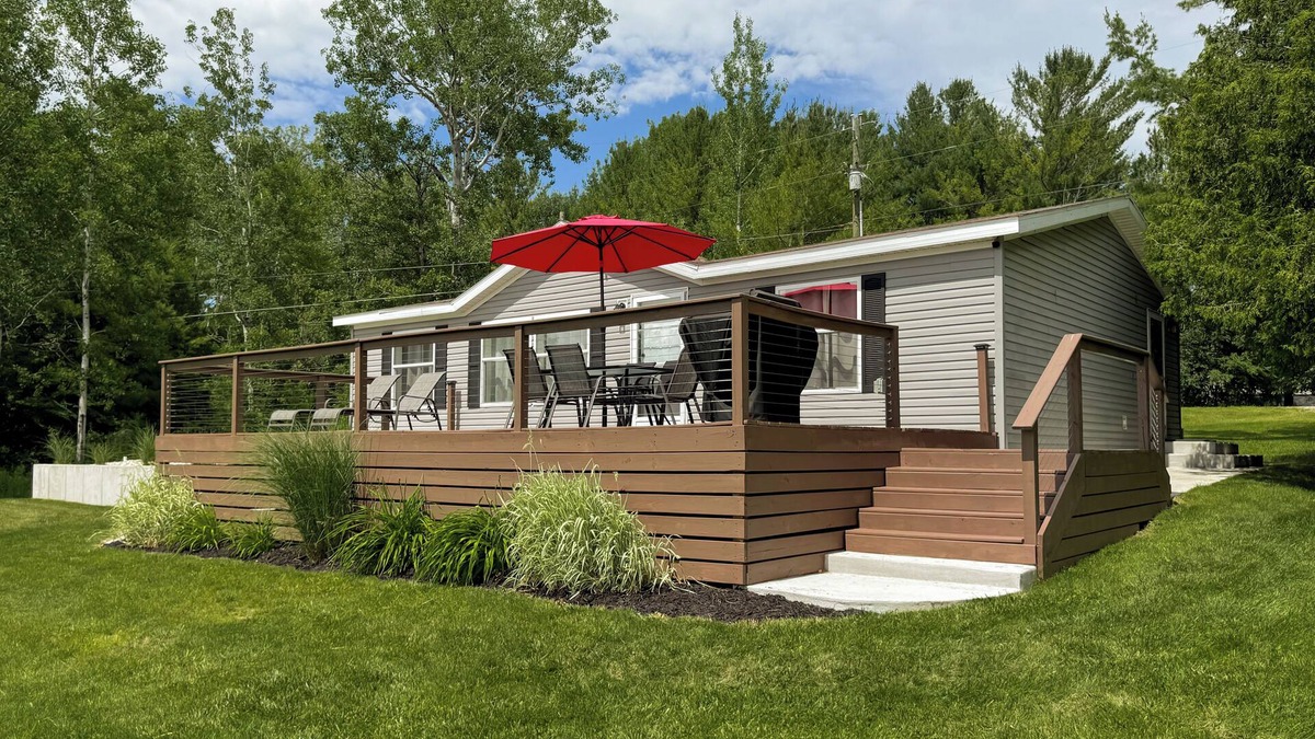 Cheboygan Cottage | Riverside Cottage w/70' Private Dock - 5 Minutes From Town!