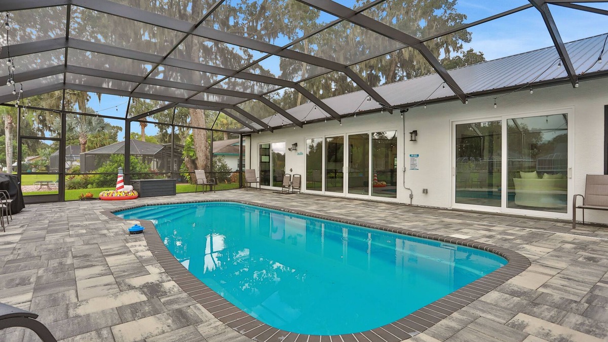 Palm Harbor House | Riverside luxury home with covered pool - Your ultimate retreat for relaxation