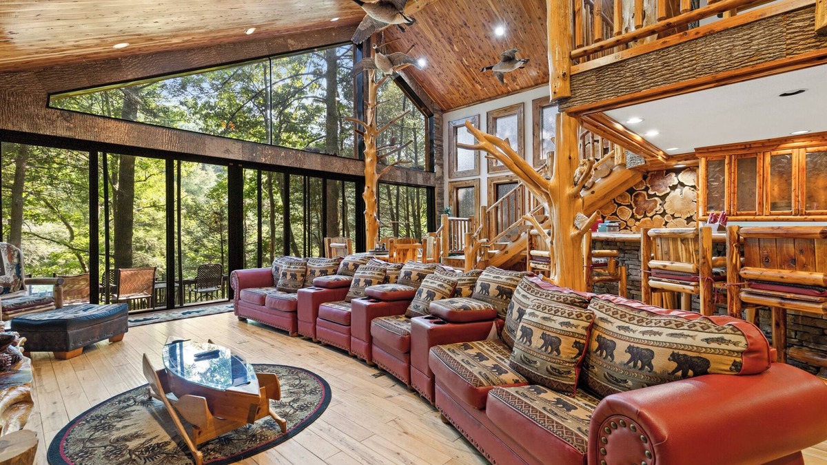 Ellijay Cabin | Riverside Luxury: Hot Tub, Fire Pit & Fishing Dock! Game Room, Fireplace!