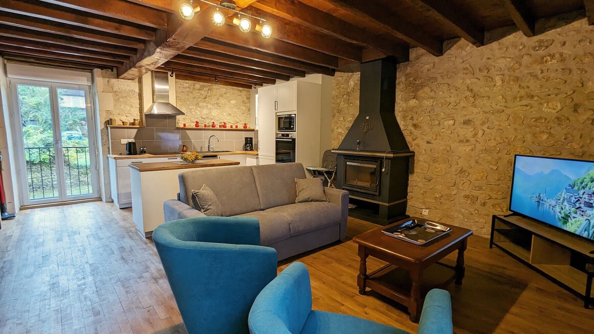 Saint-Aigny Cottage | Riverside Retreat: Historic Watermill with Private Terrace, Fireplace, and Scenic Views in Brenne Park