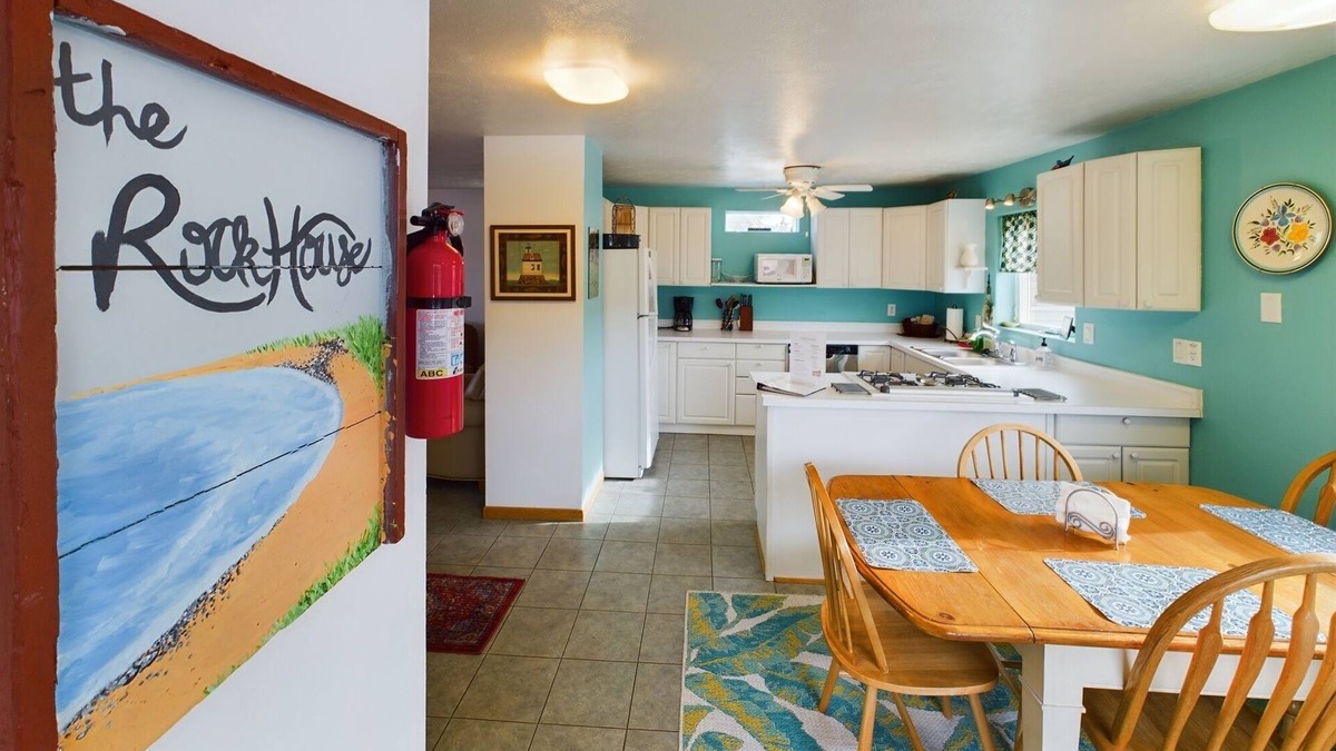 Munising House | Rock House-Downtown Munising with Private Patio, Garage, Fire-pit & BBQ Grill