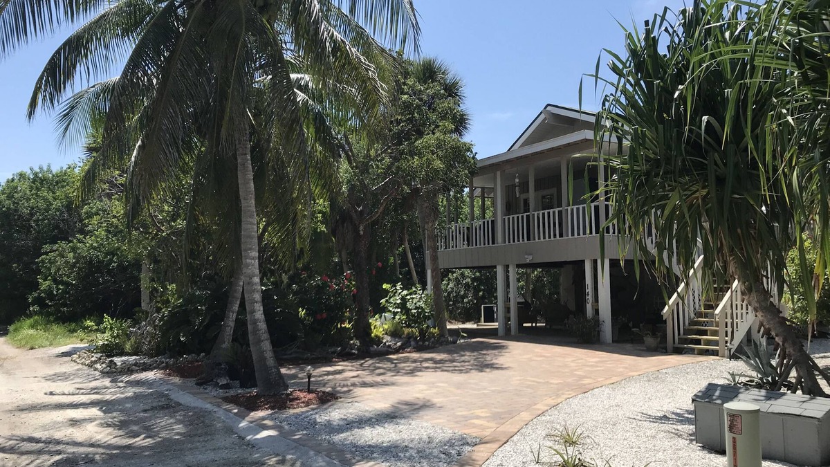 North Captiva Cottage | Romantic beach home with golf cart Remodeled Coastal charm
