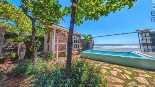 Pochomil House | Romantic Seaside Casita w Pool, AC, Fire Sunsets