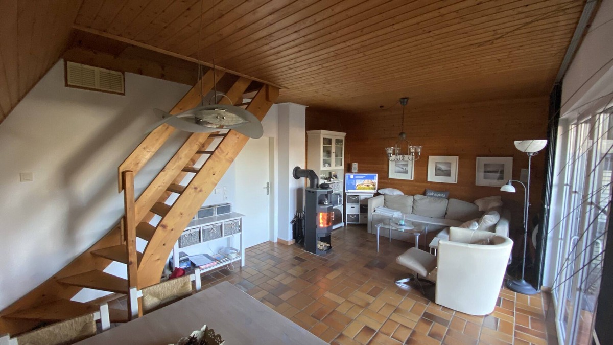 Neufeld House | Roof house with 70m² on two levels with a garden, 150m to the dike