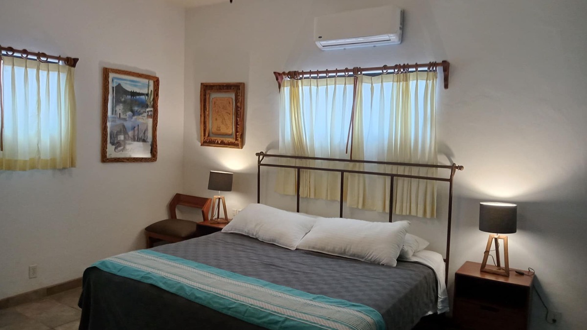 La Ribera Bed & Breakfast | Room #6 Master with one king size bed, one double bed & one double bunk bed