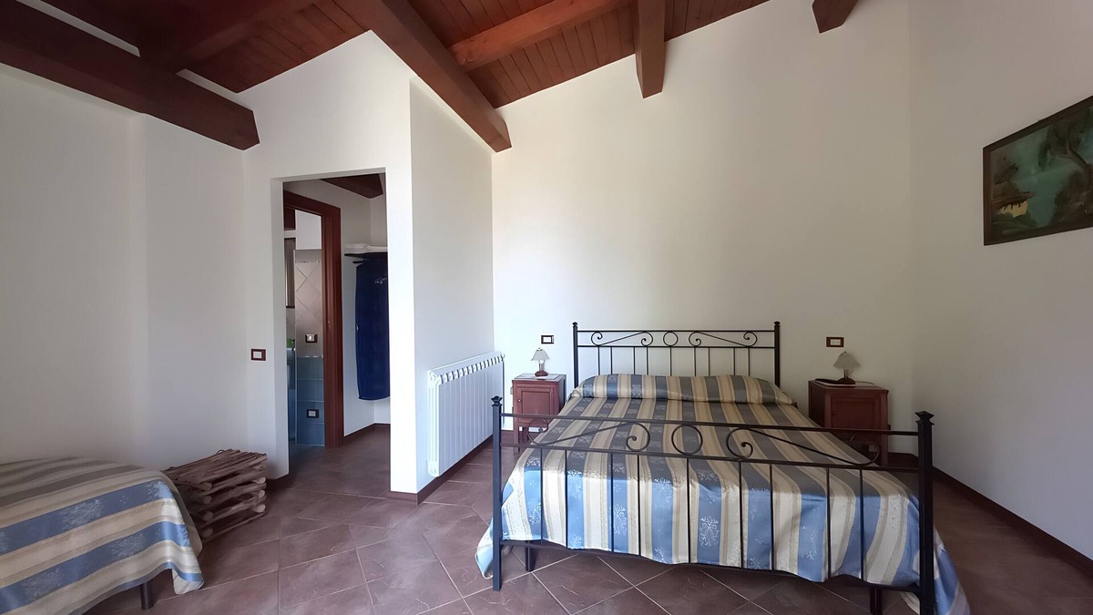 Patti Apartment | Room 'Lipari' with terrace, shared garden and air conditioning