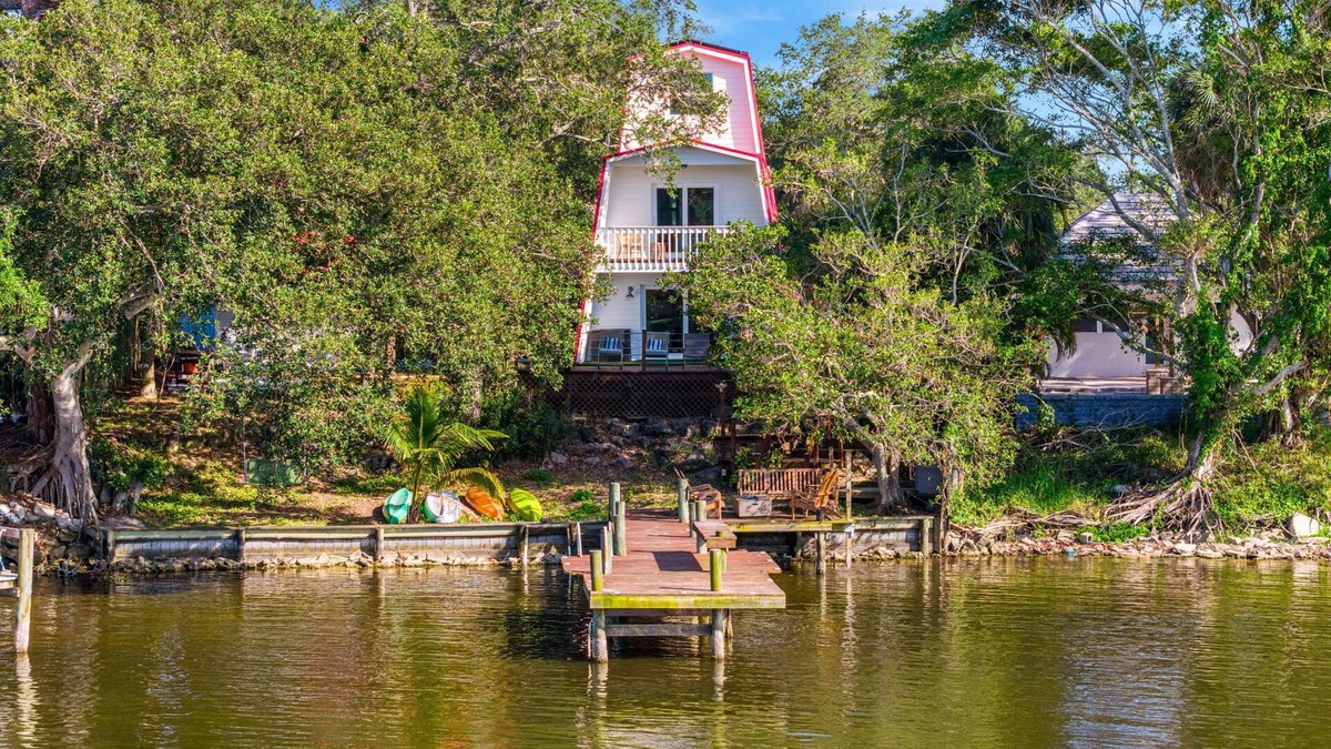 Tropic House | Rose's Riverside Chalet - 4BR Waterfront Escape - 4BR Waterfront Escape with Kayaks!