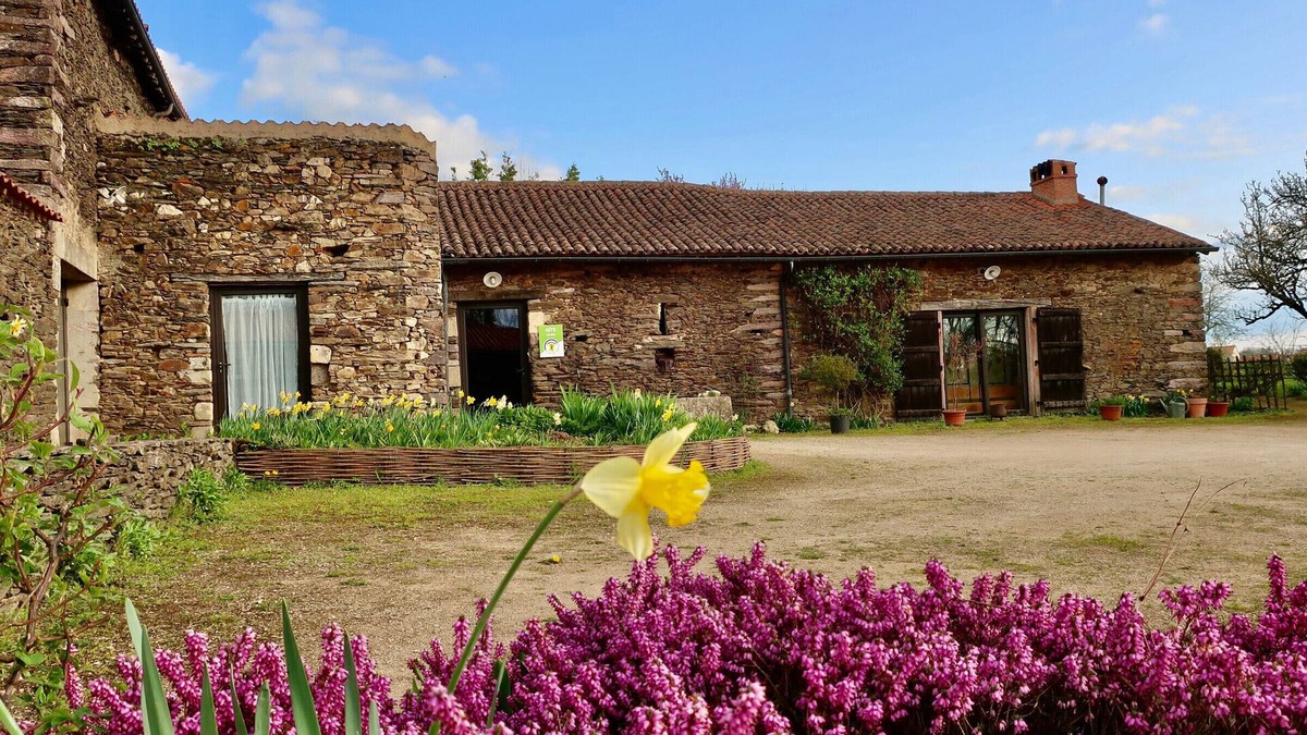La Tardiere Cottage | Rustic 18th Century Stone Cottage with Eco-Friendly Restorations, Terrace, and Playground