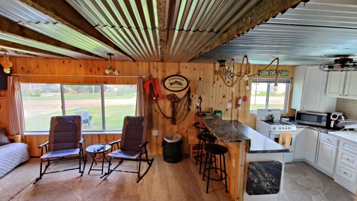 Ventura House | Rustic and charming two-bedroom home a block from the lake and park!