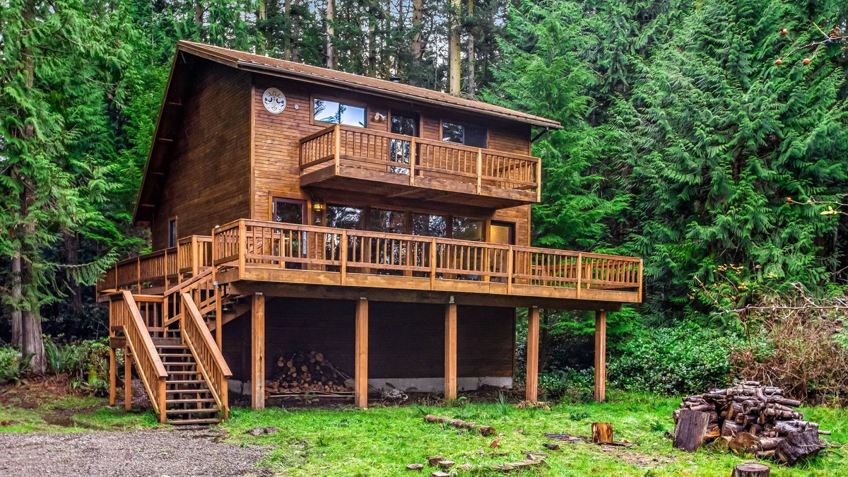 Marrowstone Cabin | Rustic cabin with wraparound deck and wood stove in a tranquil location