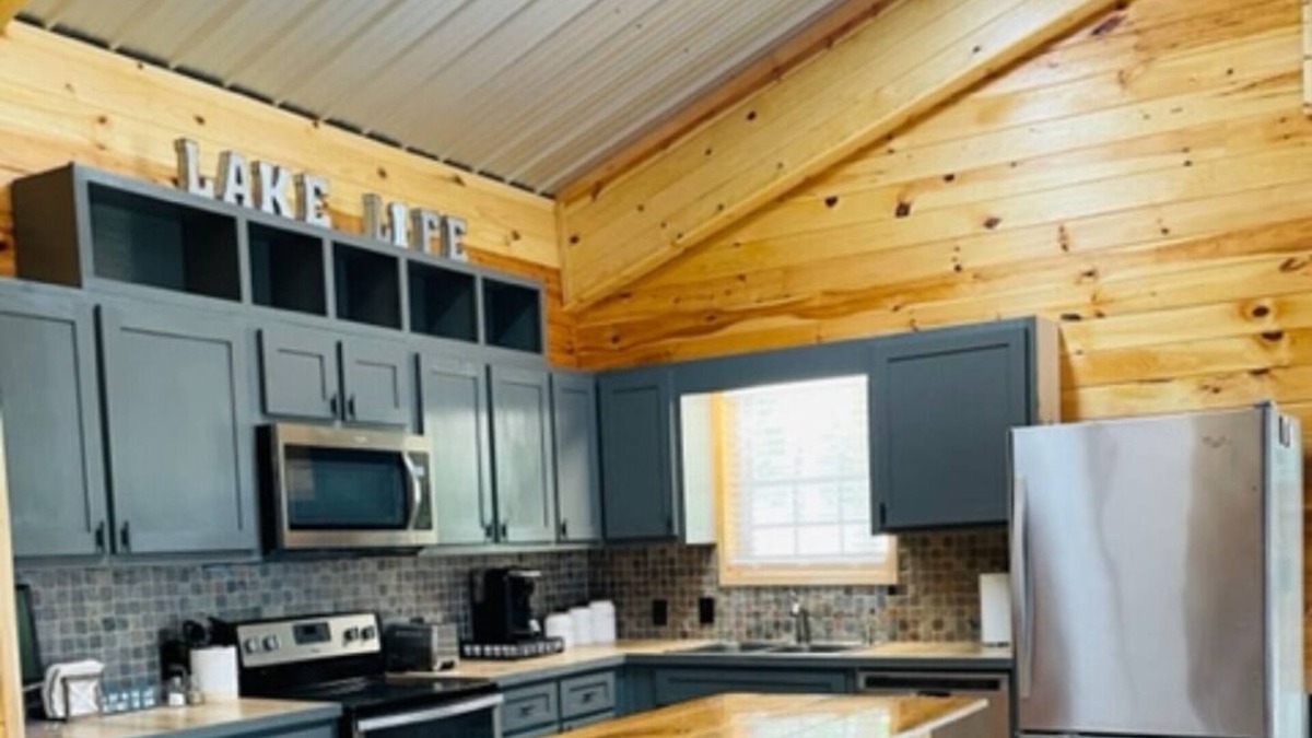 Arley Cabin | Rustic chic cabin on the lake, fire pit and peaceful lake views!