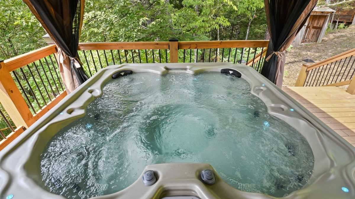 Sevierville Cabin | Rustic Hideaway 4 Bedroom Cabin by RedAwning