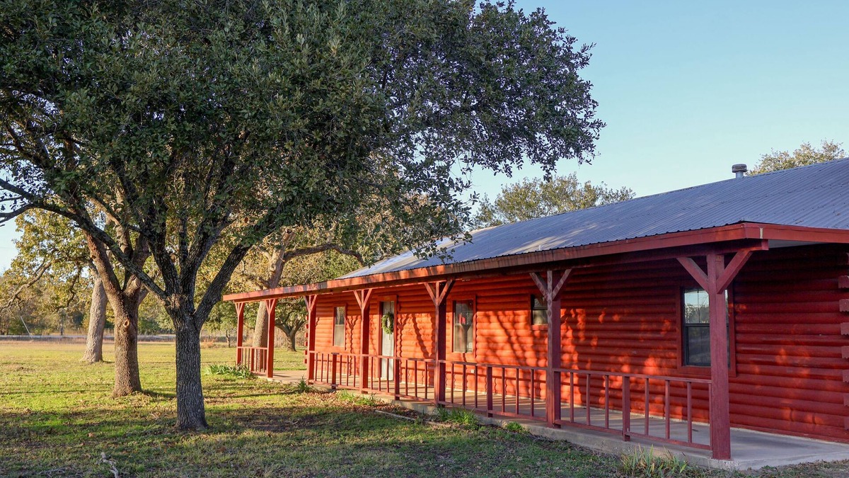 College Station House | Rustic Log Cabin Near Texas A&M – Spacious Retreat with Pond & Firepit!