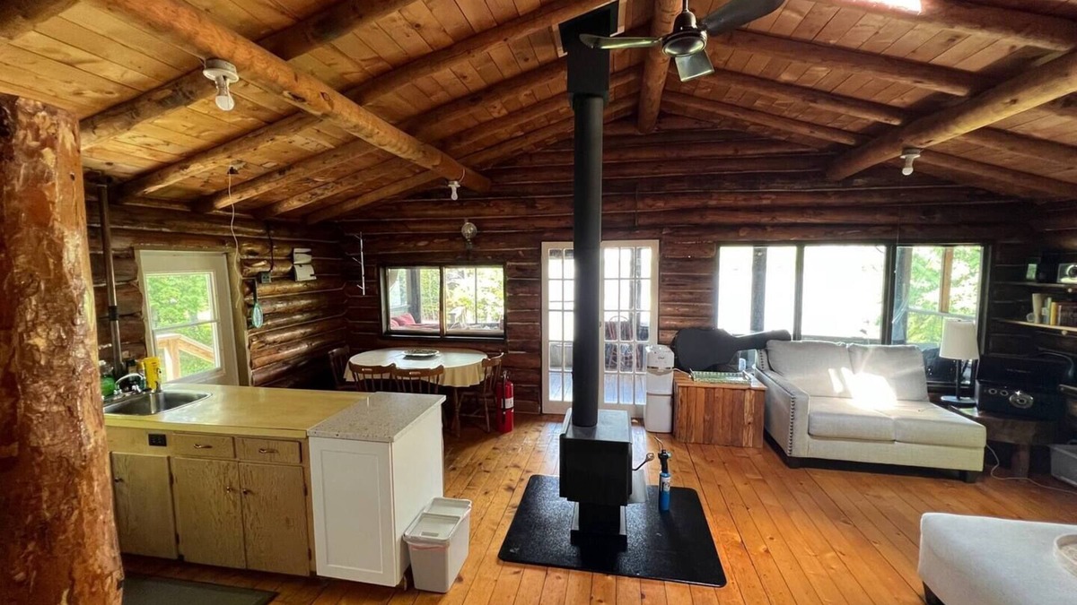 Northern Ontario Cottage | Rustic Log Cottage in Woodchuck Bay on Lake of the Woods with a Sand Beach