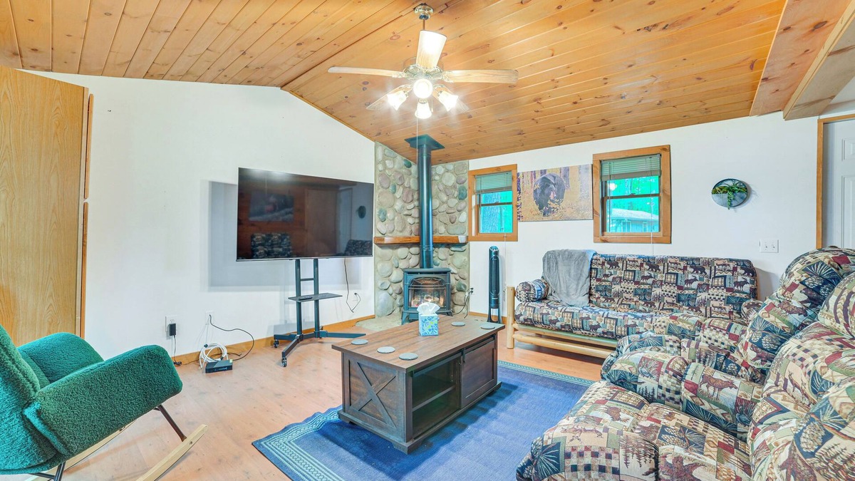 Rose City Cabin | Rustic Michigan Lakeside Cabin w/Private Dock!