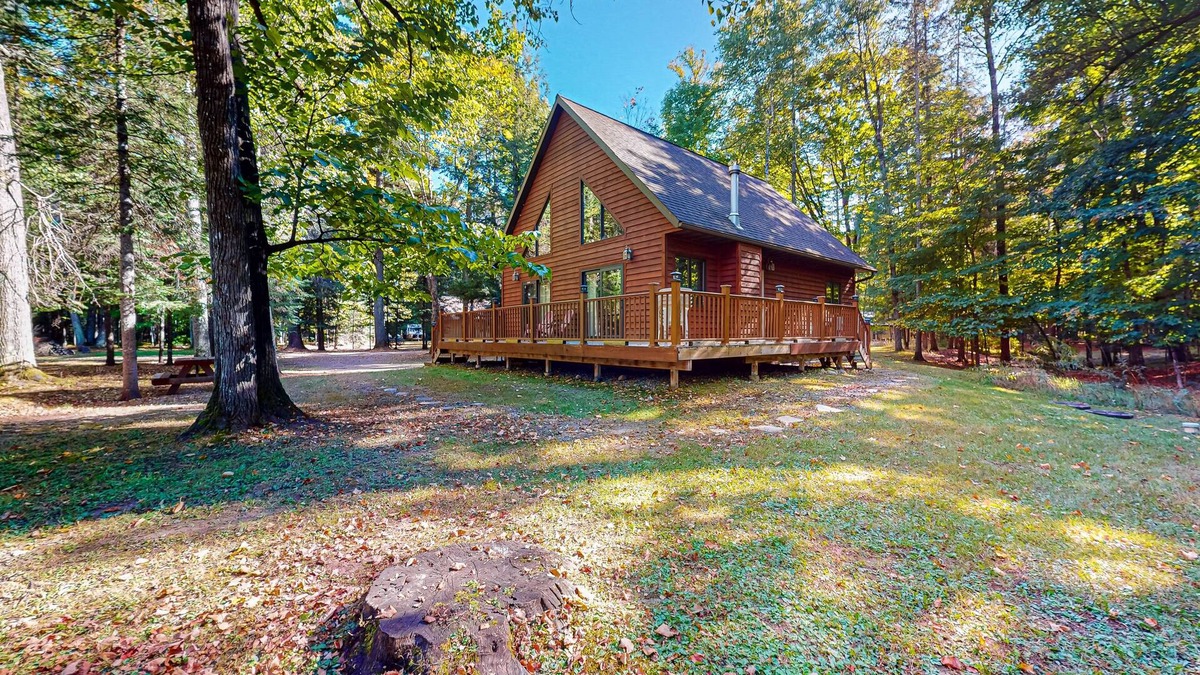 Mercer Cabin | Rustic resort cabin with lake views, deck & access to docks, canoe, paddle boats