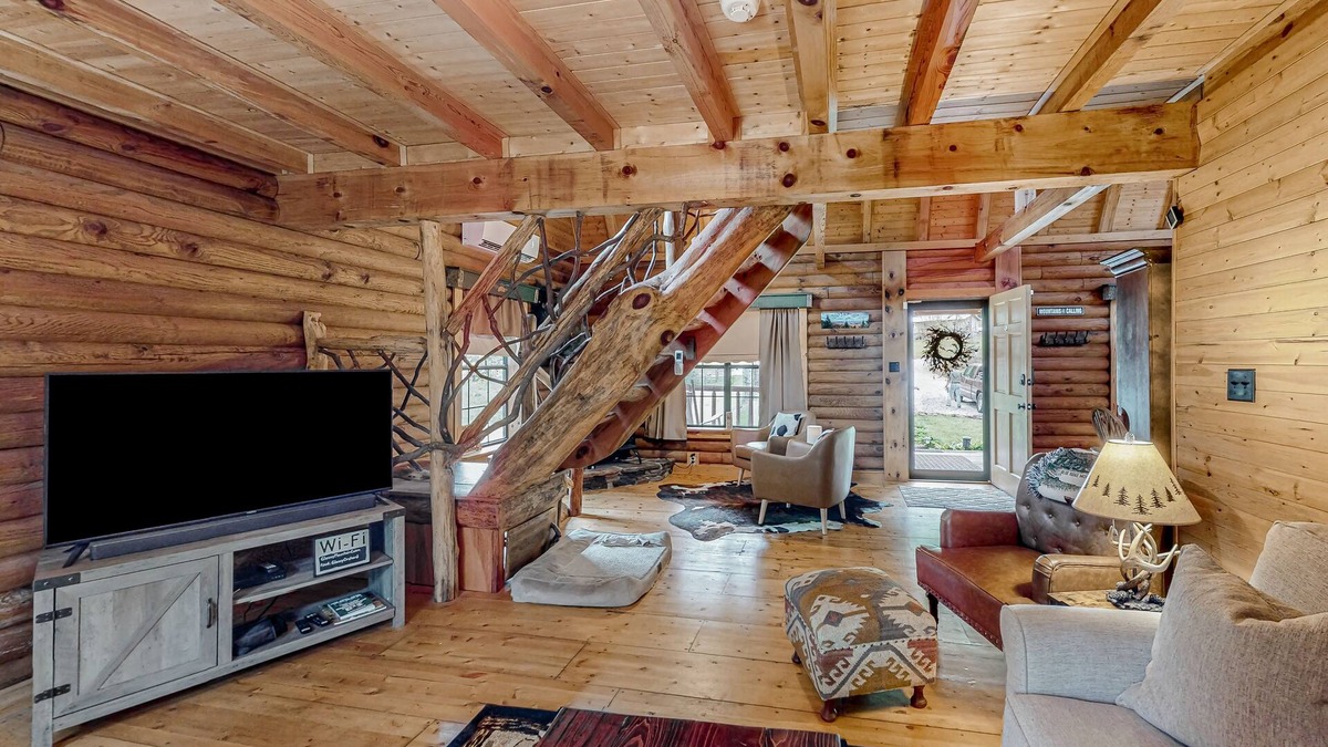 Tiger Cabin | Rustic retreat with mountain views, hot tub, grill, fireplace, central AC, & W/D