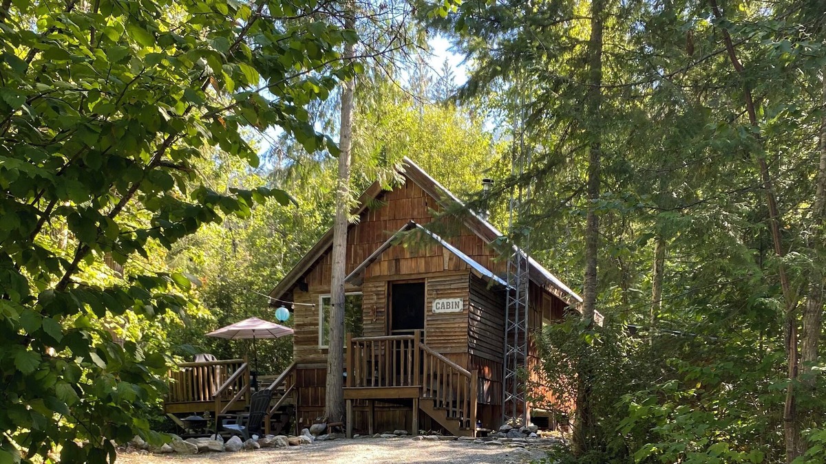 Mara Cabin | Rustic Solar cabin in the woods off grid glamming at its finest near Mara lake