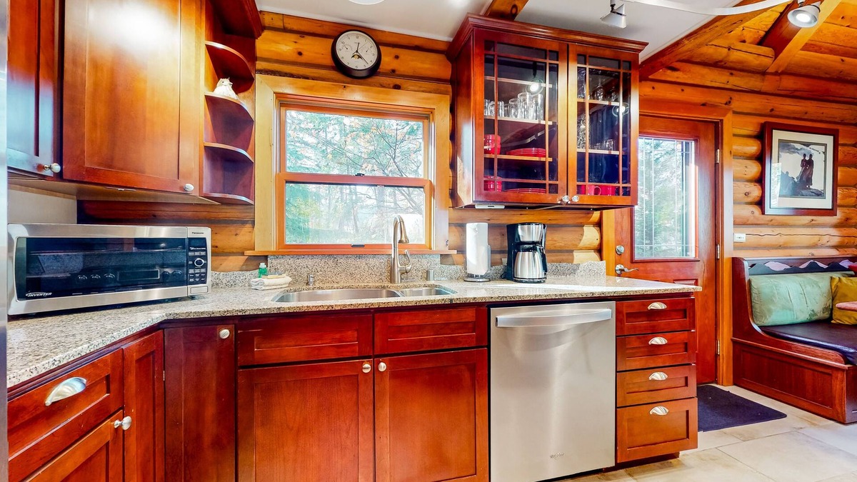 Oak Harbor Ski Chalet | Rustic waterview home, covered deck, vaulted ceilings & updated kitchen